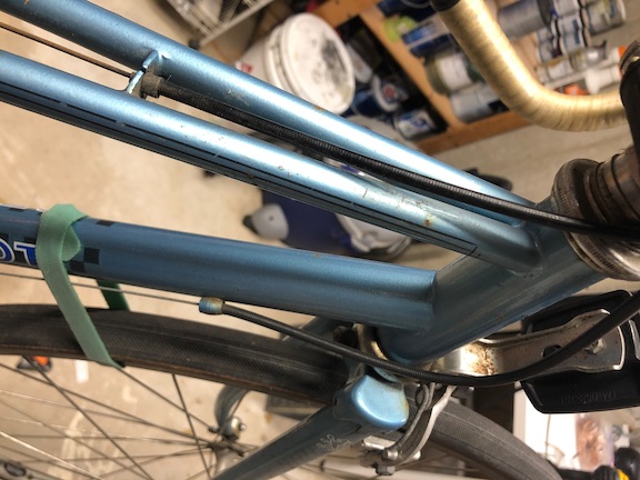 A good look at the lugless construction and clever Peugeot cable routing.